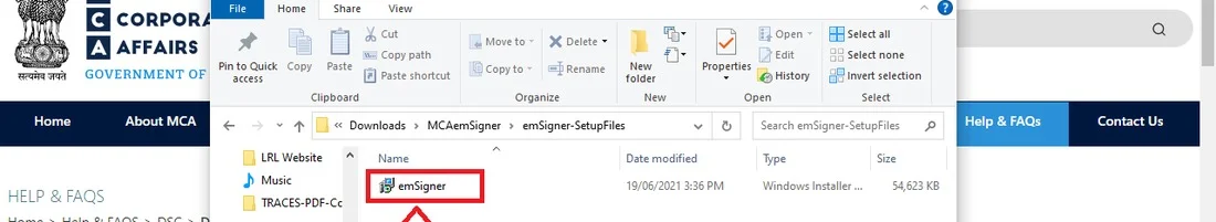 File Explorer showing the downloaded emSigner.msi installer file ready to open