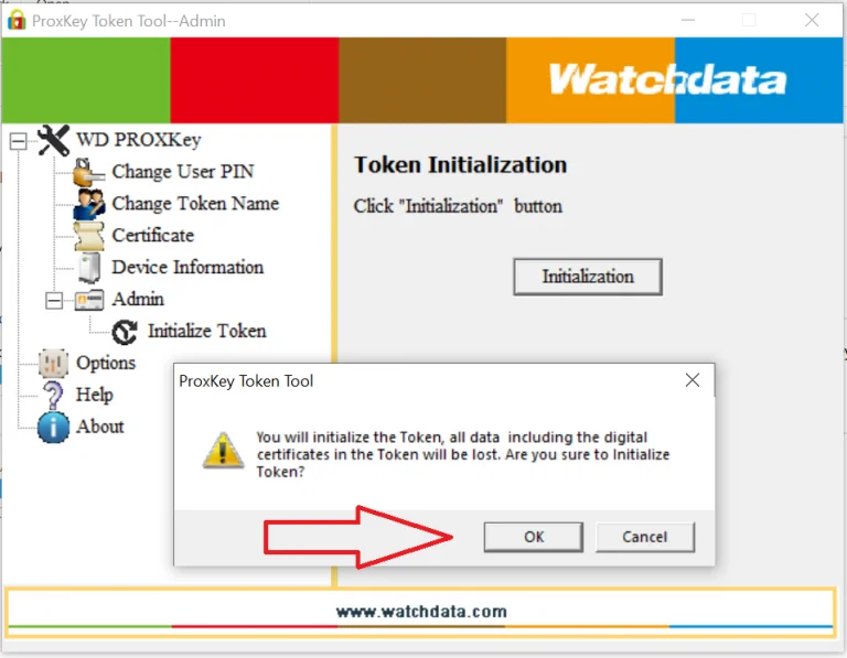 Confirmation dialog warning that all data on the token will be lost, with OK button highlighted